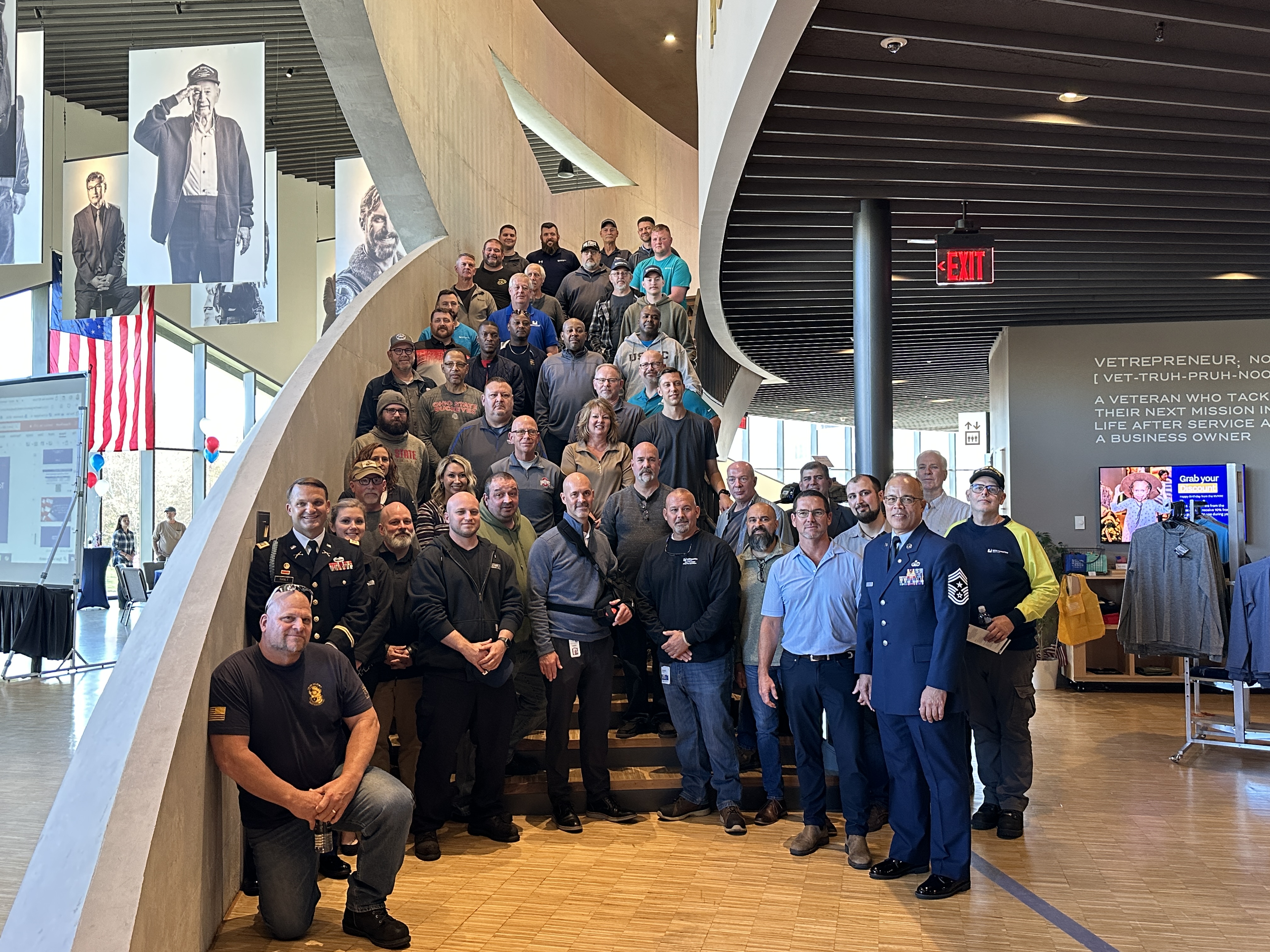 Worthington Steel veteran and active duty military employees posing for a photo at the National Veterans Memorial and Museum.