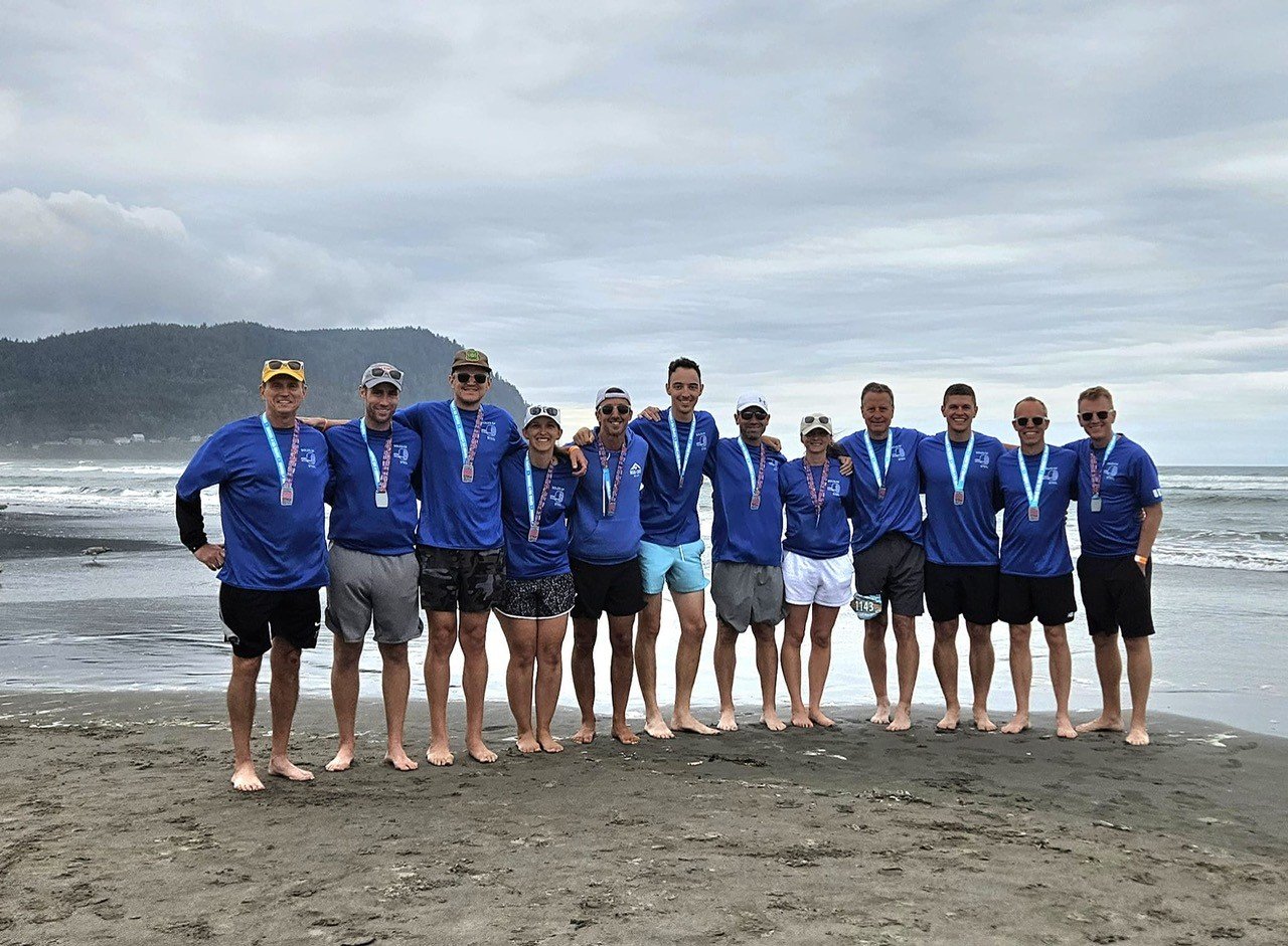 Worthington Steel employees in Oregon running a marathon race.