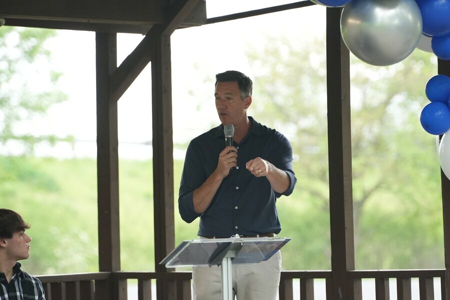 Worthington Steel president and CEO, Geoff Gilmore, speaking at an outdoor event.