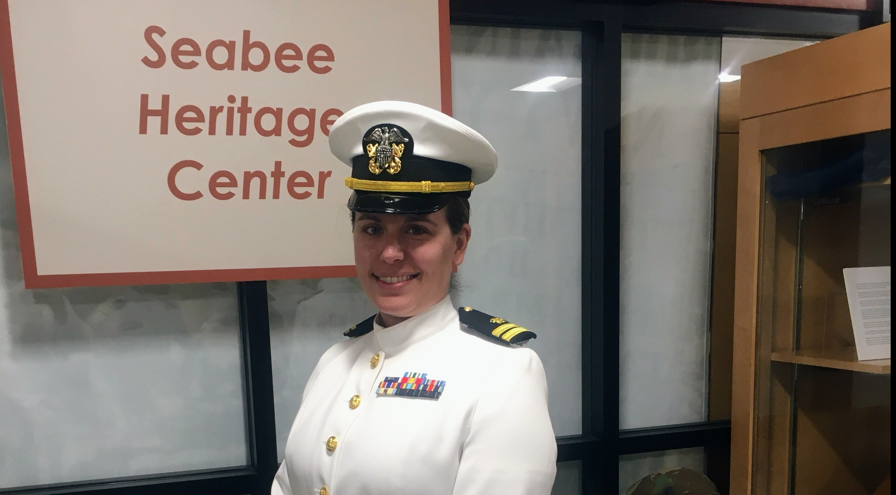 Worthington Steel employee and U.S. Navy veteran Kristina Davidson posing for a photo in her uniform.
