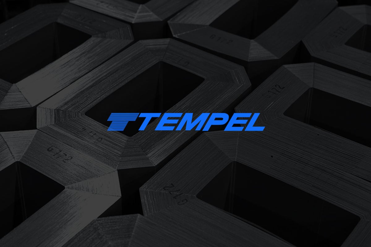 Tempel steel logo layered on electric steel laminations.