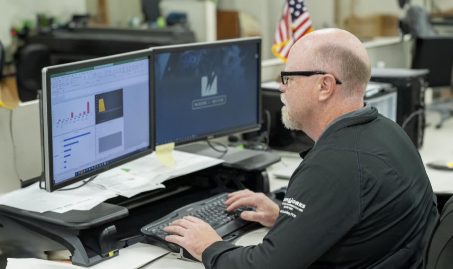 Worthington Steel materials scientist working at desk.